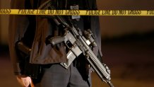Police investigate a multiple murder scene at a dance studio near Garvey Ave. & Garfield Ave., in Monterey Park on Saturday morning, Jan. 22, 2023.