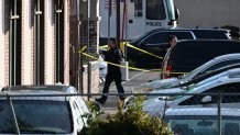 Investigators work at the scene of a mass shooting in Monterey Park, California, on January 22, 2023. - Ten people have died and at least 10 others have been wounded in a mass shooting in a largely Asian city in southern California, police said, with the suspect still at large hours later. (Photo by Robyn BECK / AFP) (Photo by ROBYN BECK/AFP via Getty Images)