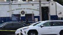 Investigators from the Federal Bureau of Investigations (FBI) work at the scene of a mass shooting in Monterey Park, California, on January 22, 2023. - Ten people have died and at least 10 others have been wounded in a mass shooting in a largely Asian city in southern California, police said, with the suspect still at large hours later. (Photo by Robyn BECK / AFP) (Photo by ROBYN BECK/AFP via Getty Images)
