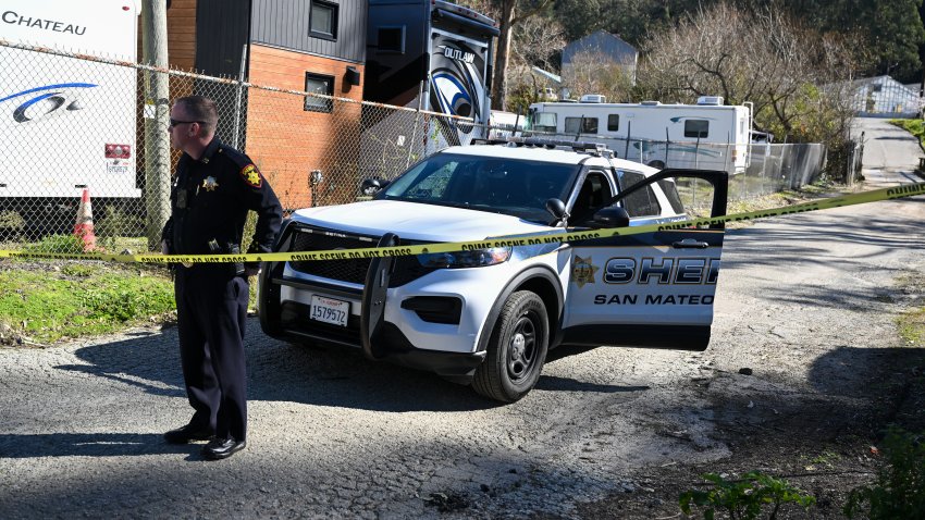 Police cordon off the crime scene of a mass shooting in Half Moon Bay.