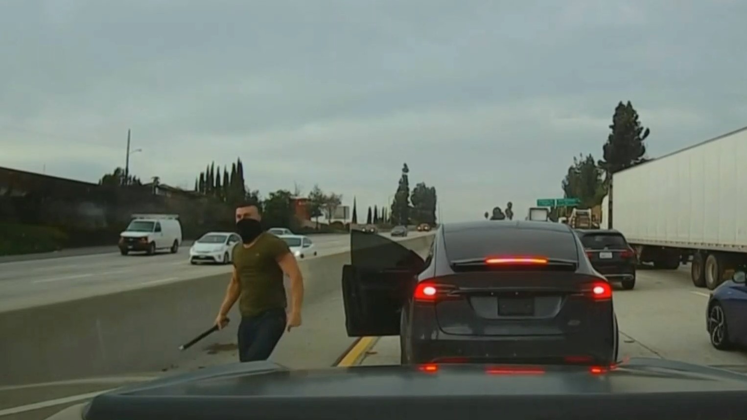 Baton-Wielding Driver Stops Tesla on California Freeway in Violent Confrontation Caught on Dashcam