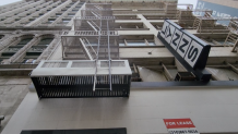 A man was found dead Wednesday in the doorway of a freight elevator at the rear of a commercial building in downtown Los Angeles.