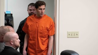 Bryan Kohberger, left, who is accused of killing four University of Idaho students in November 2022, looks toward his attorney, public defender Anne Taylor, right, during a hearing in Latah County District Court, Thursday, Jan. 5, 2023, in Moscow, Idaho.