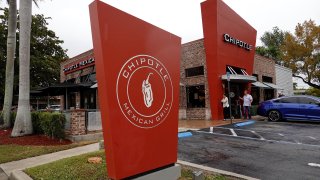 A Chipotle restaurant and signage is seen on February 09, 2022 in Miami, Florida.