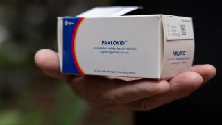 A prescription for Pfizers Paxlovid tablets outside of his apartment in Philadelphia, Pennsylvania on April 25, 2022. (Photo by Rachel Wisniewski/For the Washington Post)