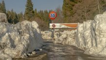 Snow piled around a 76 gas station in Lake Arrowhead.