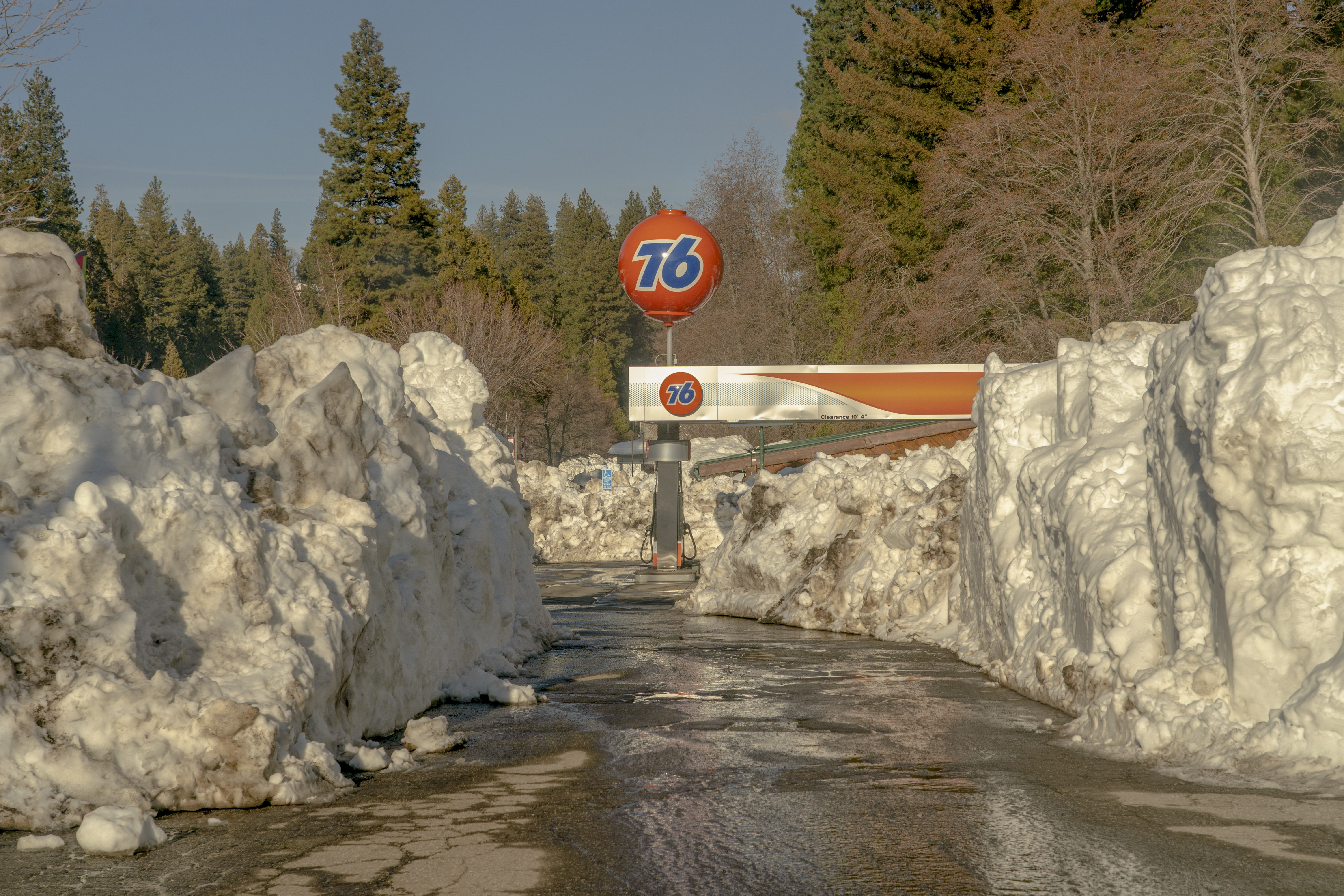 Snow piled around a 76 gas station in Lake Arrowhead.