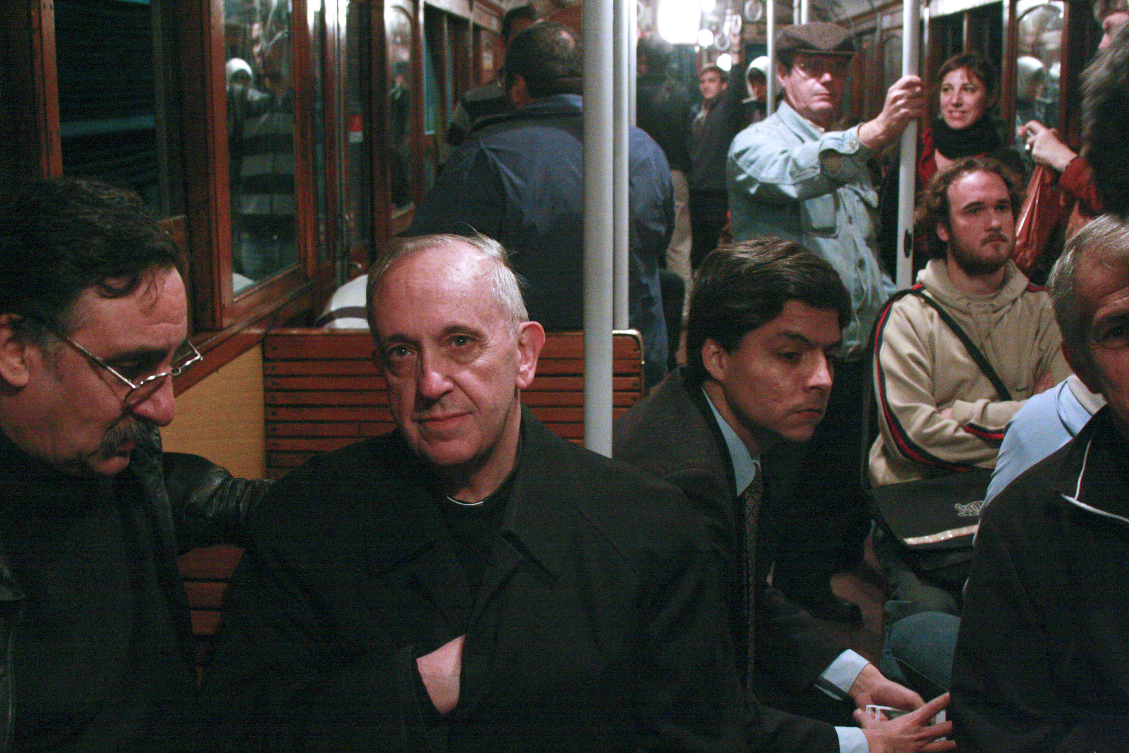 In this 2008 file photo, Cardinal Jorge Mario Bergoglio travels on the subway in Buenos Aires, Argentina. Bergoglio was hailed with pride and wonder as the “first Latino pope,” a native Spanish speaker born and raised in the South American nation of Argentina. But for some Latinos in the United States, there’s a catch: Pope Francis’ parents were born in Italy. The conversation about Pope Francis’ ethnicity is rooted in history and geography. Latin America is a complex region of deep racial and class narratives.