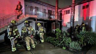 OCFA firefighters at the scene of a fire Thursday March 30, 2023 in Santa Ana.