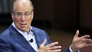 Andrew Ross Sorkin speaks with BlackRock CEO Larry Fink during the New York Times DealBook Summit in the Appel Room at the Jazz At Lincoln Center on November 30, 2022 in New York City.