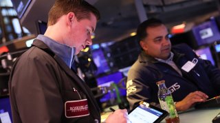 Traders work on the floor of the New York Stock Exchange during morning trading on April 10, 2023 in New York City. 