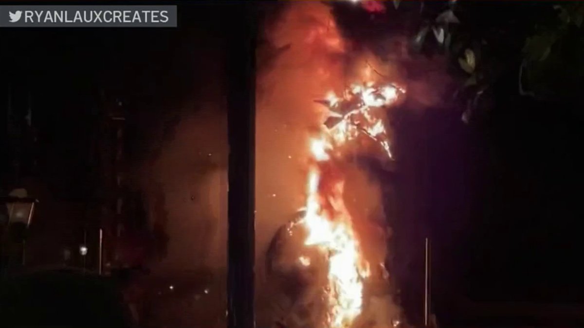 Watch Disneyland's dragon catch on fire during Fantasmic show