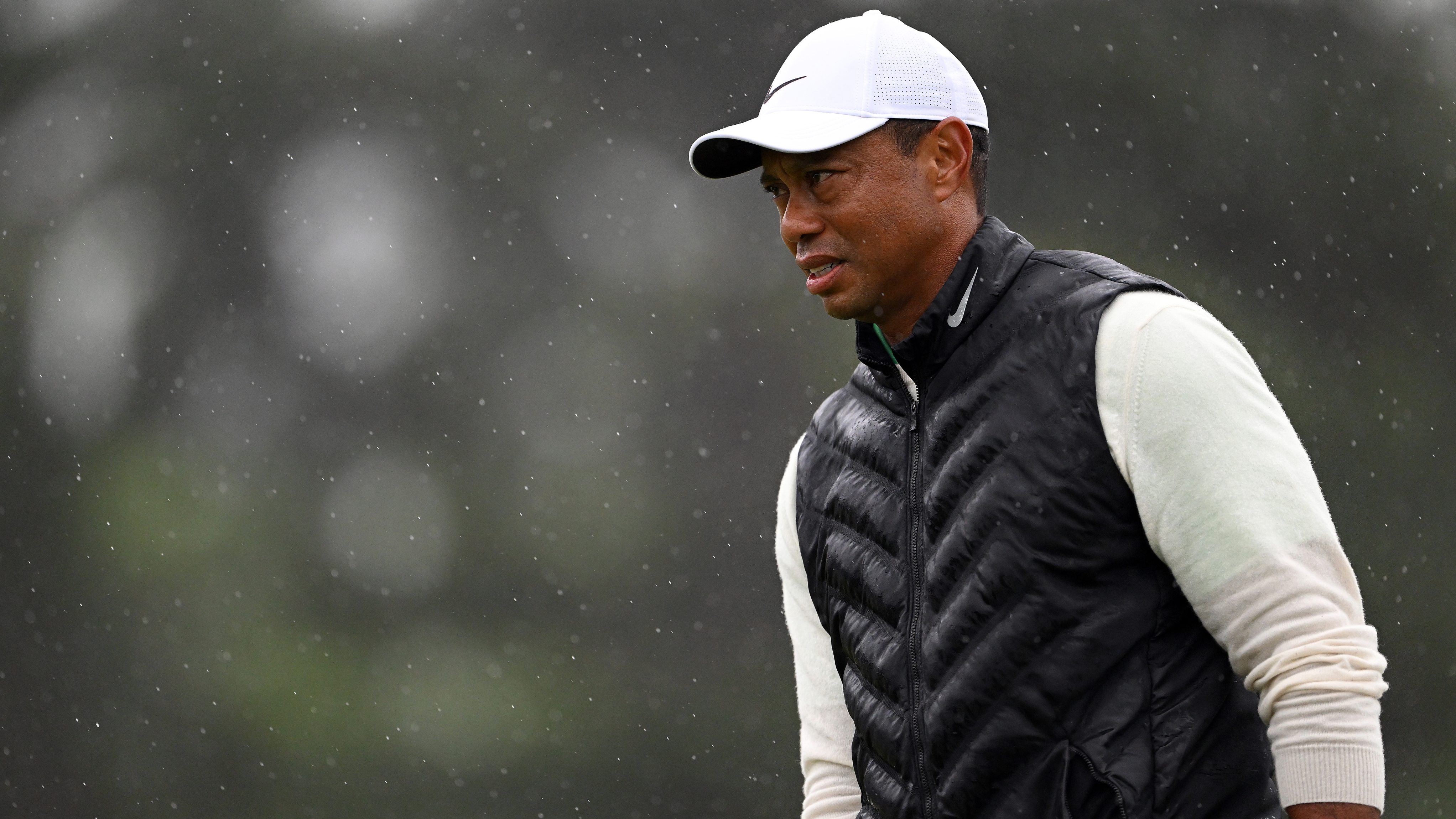 The Masters: Third round suspended as rain drenches field at