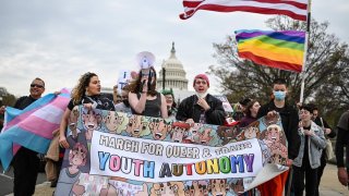 Supporters of LGBTQA+ rights march towards Capitol Hill in Washington, DC on March 31, 2023.