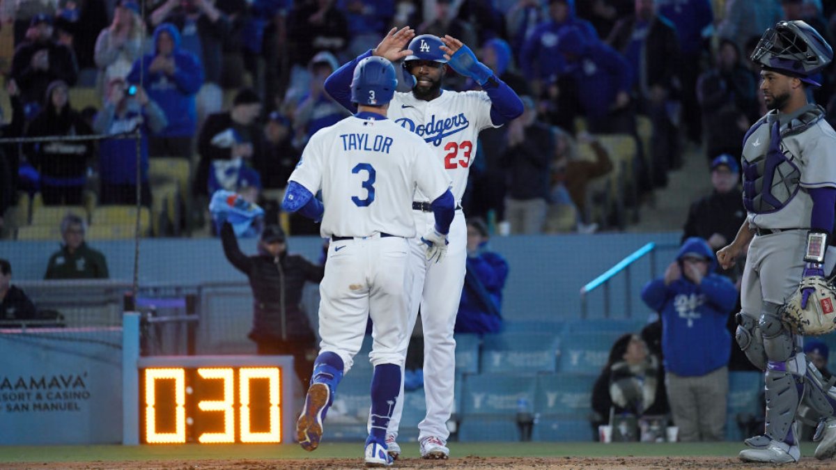 Rockies' Jurickson Profar injured after slamming into Dodger