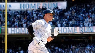 Aaron Judge #99 of the New York Yankees runs the bases after his first inning home run against the San Francisco Giants on Opening Day at Yankee Stadium on March 30, 2023 in Bronx, New York.