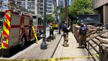 Emergency personnel respond to the scene of active shooting in Atlanta, May 3, 2023. At least one person died, with four others injured, during a shooting in Atlanta's Midtown neighborhood.