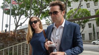 Actor Danny Masterson arrives at Clara Shortridge Foltz Criminal Justice Center in Los Angeles on May 31, 2023, with wife Bijou Phillips.