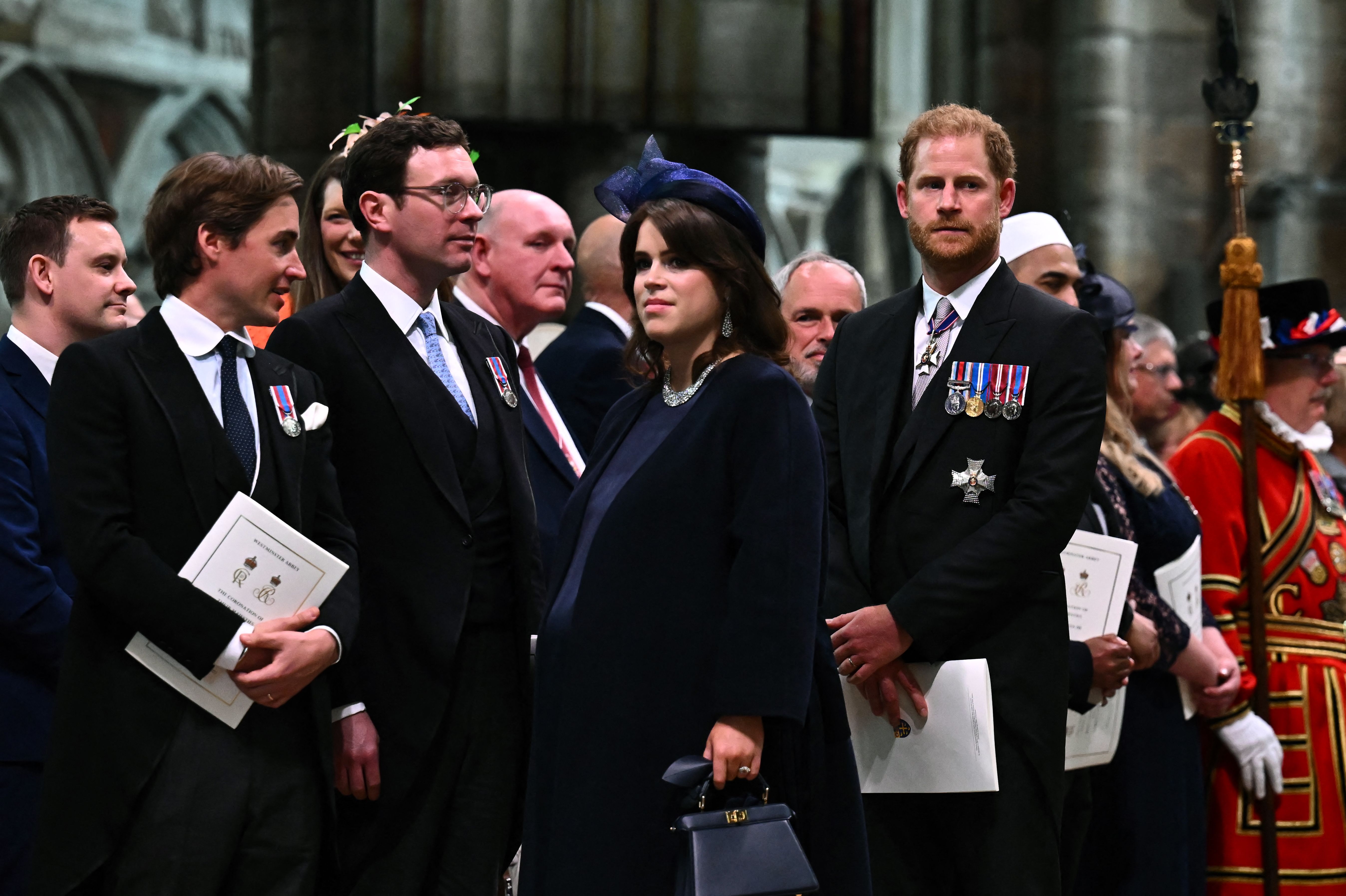 Britain’s Prince Harry, Duke of Sussex looks on as King Charles III leaves Westminster Abbey after the Coronation Ceremonies in central London on May 6, 2023.