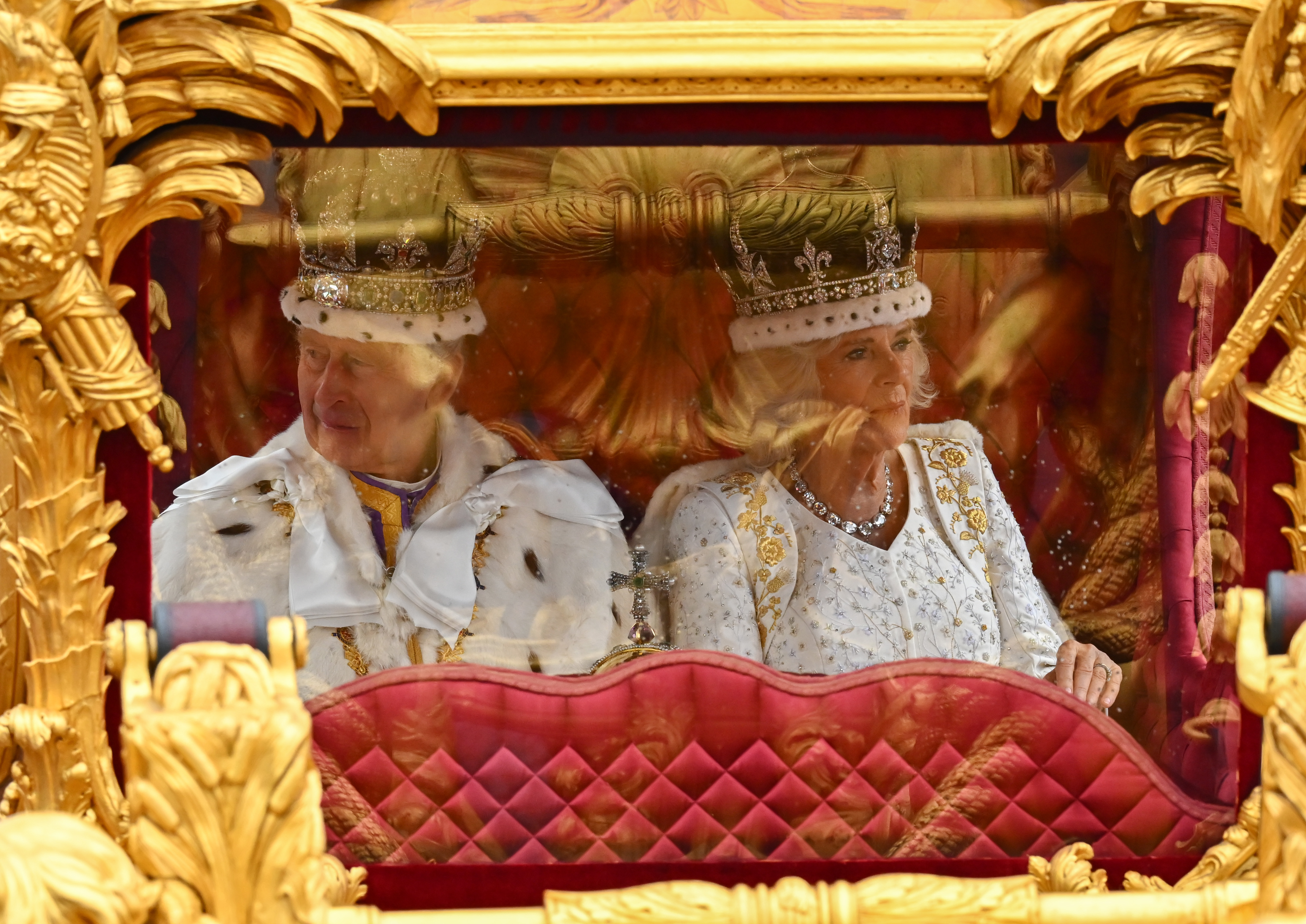 King Charles III and Queen Camilla sets off from Westminster Abbey on route to Buckingham Palace during their coronation on May 6, 2023 in London.