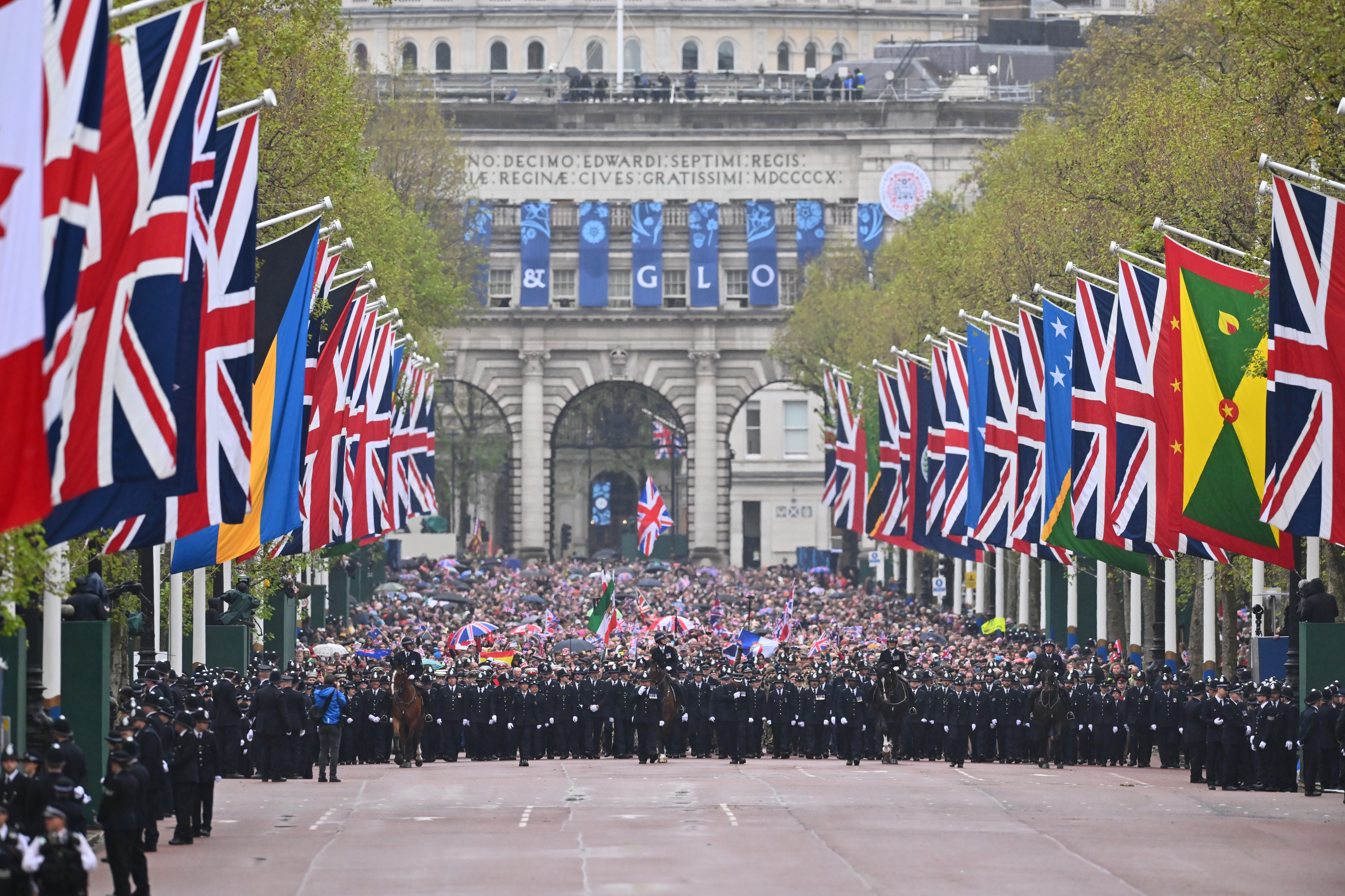 The military procession, the largest of its kind since the 1953 Coronation of Her Majesty Queen Elizabeth II, makes its way down The Mall towards Buckingham Palace during the Coronation of King Charles III and Queen Camilla on May 6, 2023 in London, England.