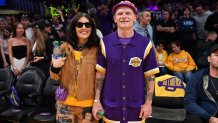 Flea and Melody Ehsani attend a playoff basketball game between the Los Angeles Lakers and the Golden State Warriors.