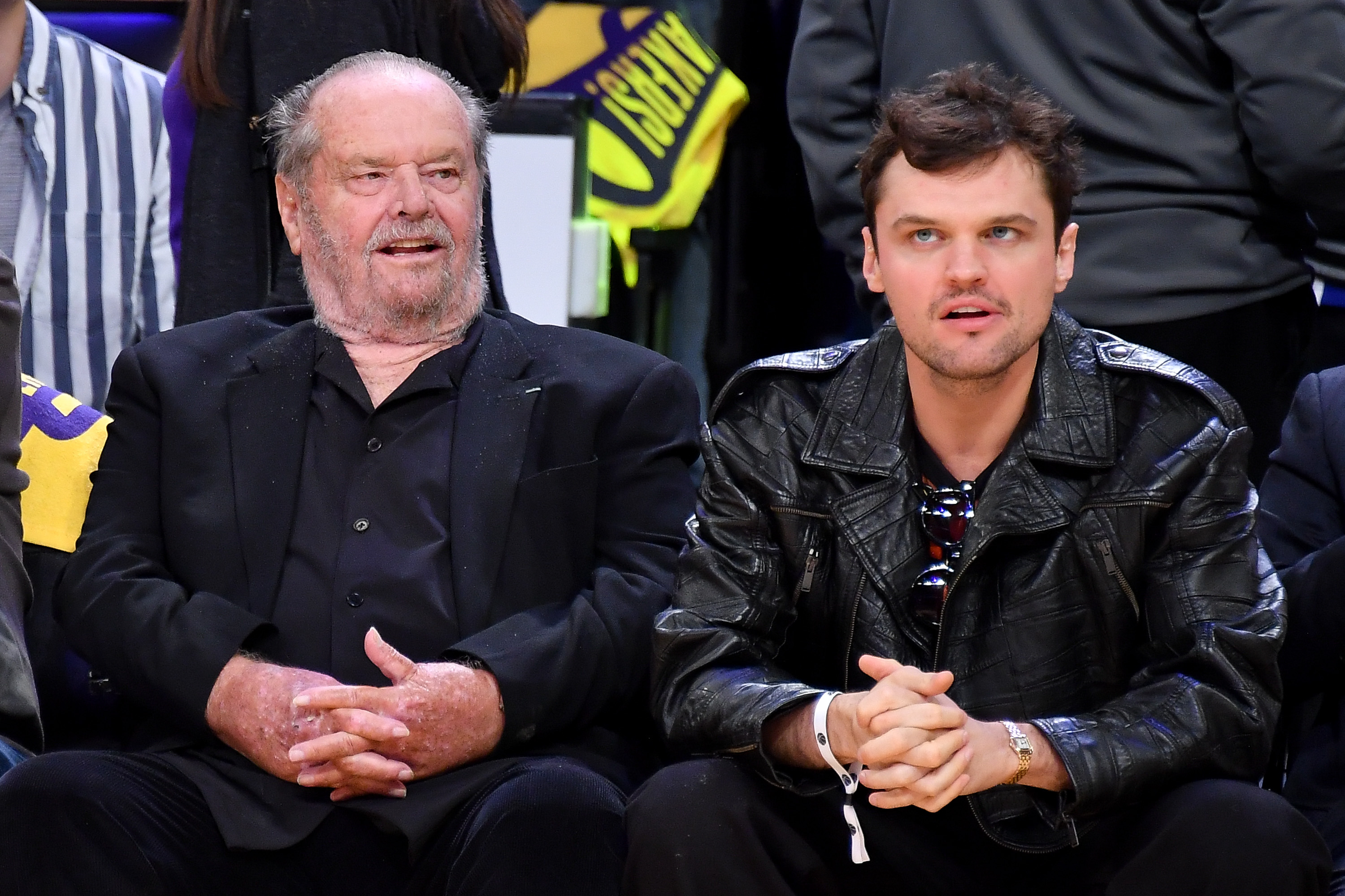 Jack Nicholson and Ray Nicholson attend a playoff basketball game between the Los Angeles Lakers and the Golden State Warriors.