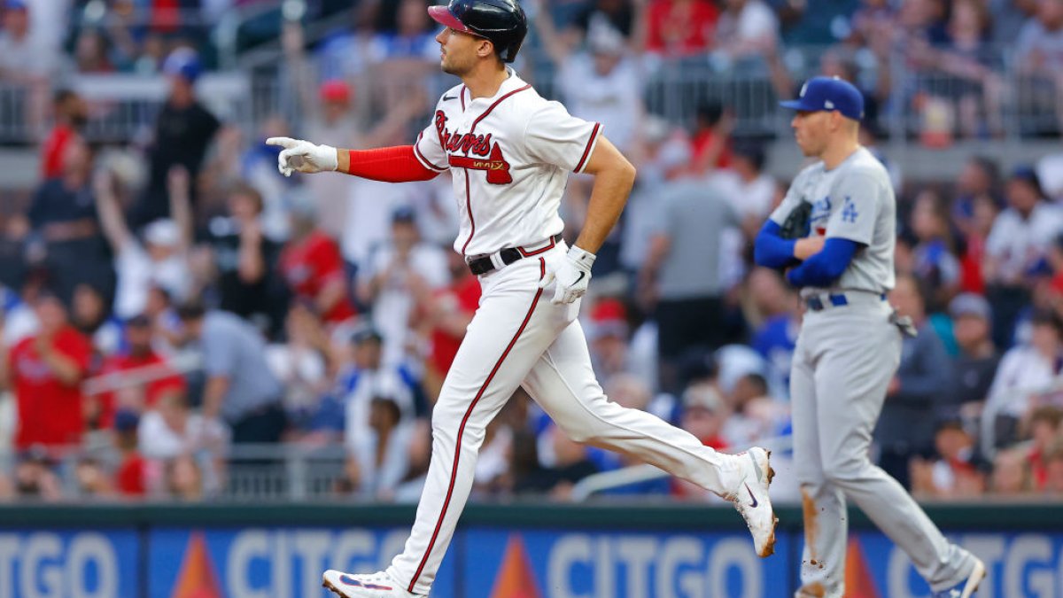 Matt Olson of the Atlanta Braves rounds first base after hitting a News  Photo - Getty Images