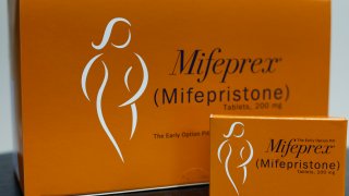 In this photo illustration,  packages of Mifepristone tablets are displayed at a family planning clinic on April 13, 2023 in Rockville, Maryland. 