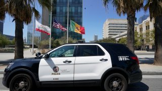 FILE – A Los Angeles Police Department vehicle is parked outside the LAPD headquarters in downtown Los Angeles on July 8, 2022. On Thursday, June 22, 2023, the Supreme Court of California ruled that police are not immune from civil lawsuits for misconduct that happens during investigations. (AP Photo/Damian Dovarganes, File)