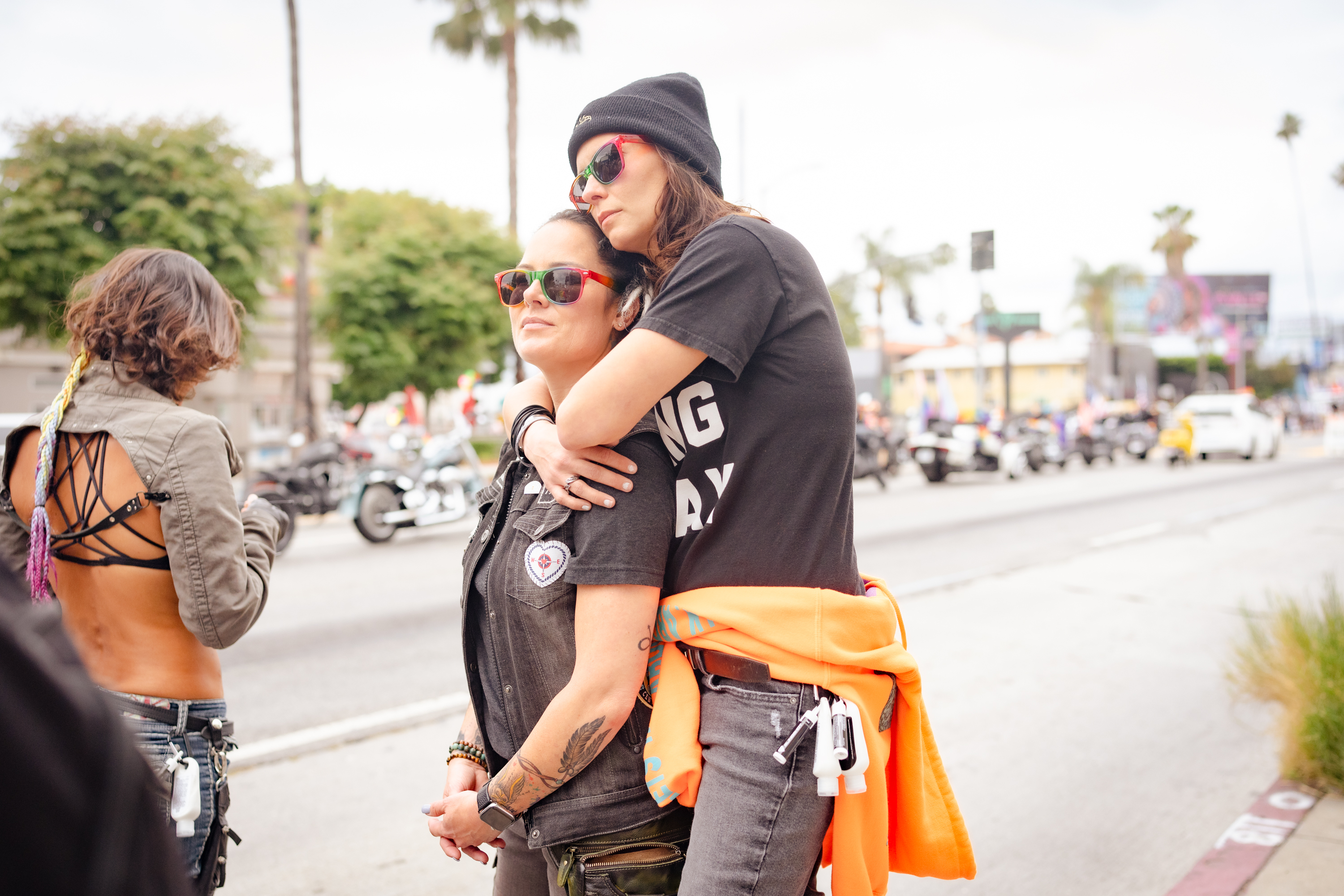 Attendees embrace during the LA Pride Parade in Los Angeles, California, US, on Sunday, June 11, 2023. Comedian Margaret Cho serves as a grand marshal of the LA Pride Parade as the annual procession returns for its 53rd year. Photographer: Morgan Lieberman/Bloomberg via Getty Images