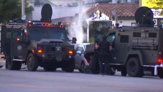 Two armored SWAT vehicles at the scene of a Studio City standoff Tuesday June 20, 2023.