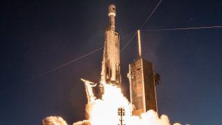 A Falcon Heavy rocket launches the USSF-67 mission on January 15, 2023 from NASA’s Kennedy Space Center in Florida.
