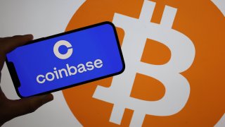 SAN ANSELMO, CALIFORNIA – JUNE 06: In this photo illustration, the Coinbase logo is displayed on a screen on June 06, 2023 in San Anselmo, California. The Securities And Exchange Commission has filed a lawsuit against cryptocurrency exchange Coinbase for allegedly violating securities laws by acting as an exchange, a broker and a clearing agency without registering with the Securities and Exchange Commission. (Photo Illustration by Justin Sullivan/Getty Images)