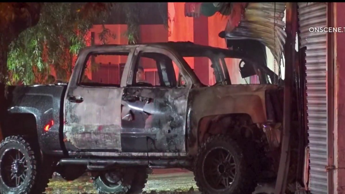 Pickup truck catches on fire after crashing into building in East LA ...