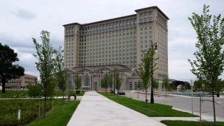 Michigan Central Station is shown, July 13, 2023, in Detroit. On July 18, 2013, a state-appointed manager made Detroit the largest U.S. city to file for bankruptcy. A decade later, the Motor City has risen from the ashes of insolvency, with balanced budgets, revenue increases and millions of dollars socked away. Corktown, a neighborhood just east of downtown, got a boost in 2018 when Ford Motor Co. bought and began renovating the train station, which for years was a symbol of the city’s blight. The building will be part of a campus focusing on autonomous vehicles. (AP Photo/Carlos Osorio)