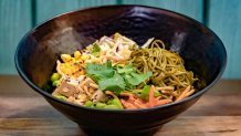 Soba Noodle Salad (Aunt Cass Café) – with tofu, cabbage, edamame, carrots, roasted corn, scallions, and cilantro topped with crispy shallots and sesame ginger dressing. Available later in summer 2023.For more details, visit DisneyParksBlog.com. (David Nguyen/Disneyland Resort)