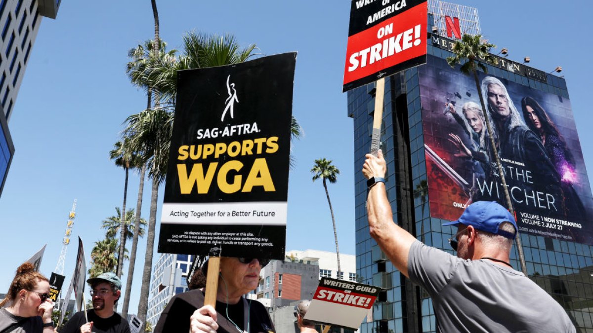 Striking actors, writers swarm Hollywood in massive solidarity march ...