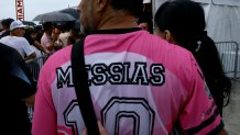 A fan wears a shirt reading "Messias" outside DRV PNK Stadium in Fort Lauderdale, Florida, on July 16, 2023, as Argentine soccer star Lionel Messi is presented as the newest player for Major League Soccer's Inter Miami CF. (Photo by Eva Marie UZCATEGUI / AFP) (Photo by EVA MARIE UZCATEGUI/AFP via Getty Images)