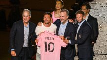 Argentine soccer star Lionel Messi (2nd L) is presented by (from R) owners of Inter Miami CF David Beckham, Jose R. Mas and Jorge Mas as the newest player for Major League Soccer's Inter Miami CF, at DRV PNK Stadium in Fort Lauderdale, Florida, on July 16, 2023. (Photo by GIORGIO VIERA / AFP) (Photo by GIORGIO VIERA/AFP via Getty Images)