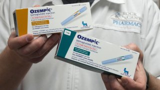 A pharmacist displays boxes of Ozempic, a semaglutide injection drug used for treating type 2 diabetes made by Novo Nordisk, at Rock Canyon Pharmacy in Provo, Utah, U.S. March 29, 2023.