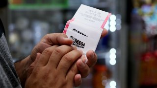 The Mega Millions jackpot hit a record $1.55 billion on Aug. 7, 2023.