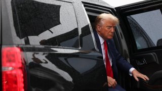 Former president Donald Trump arrives at Ronald Reagan Washington National Airport in Arlington, Va. on Thursday, August 3, 2023 after appearing at E. Barrett Prettyman United States Court House. 