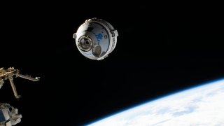 Boeing’s Starliner spacecraft is seen before docking with the International Space Station on May 20, 2022 during the uncrewed OFT-2 mission.