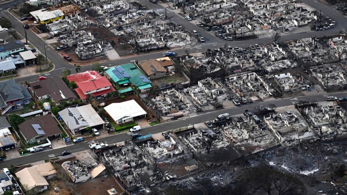 Aerial photos show total destruction as wildfires ravage historic