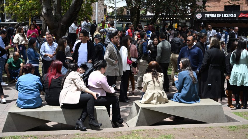 People remain on the streets after an eartquake in Bogota, on August 17, 2023. A strong earthquake shook Bogota midday on Thursday, causing a brief wind of panic in the streets of the Colombian capital, AFP noted. The quake was of a magnitude of 6.1 and took place at 12:04 p.m. local time, according to a bulletin from the Colombian geological service published on the X network (formerly Twitter). Buildings shook, sirens went off and thousands of people, some in panic, immediately came out of the buildings to rush into the streets.