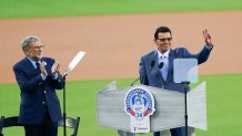 Former Los Angeles Dodgers pitcher Fernando Valenzuela greets the crowd during his jersey retirement ceremony before the baseball game between the Dodgers and the Colorado Rockies, Friday, Aug. 11, 2023, in Los Angeles. (AP Photo/Ryan Sun)