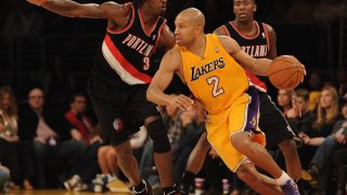 LOS ANGELES, CA – FEBRUARY 20: Derek Fisher #2 of the Los Angeles Lakers dribbles around Gerald Wallace #3 and Jamal Crawford #11 of the Portland Trail Blazers during the game at Staples Center on February 20, 2012 in Los Angeles, California.