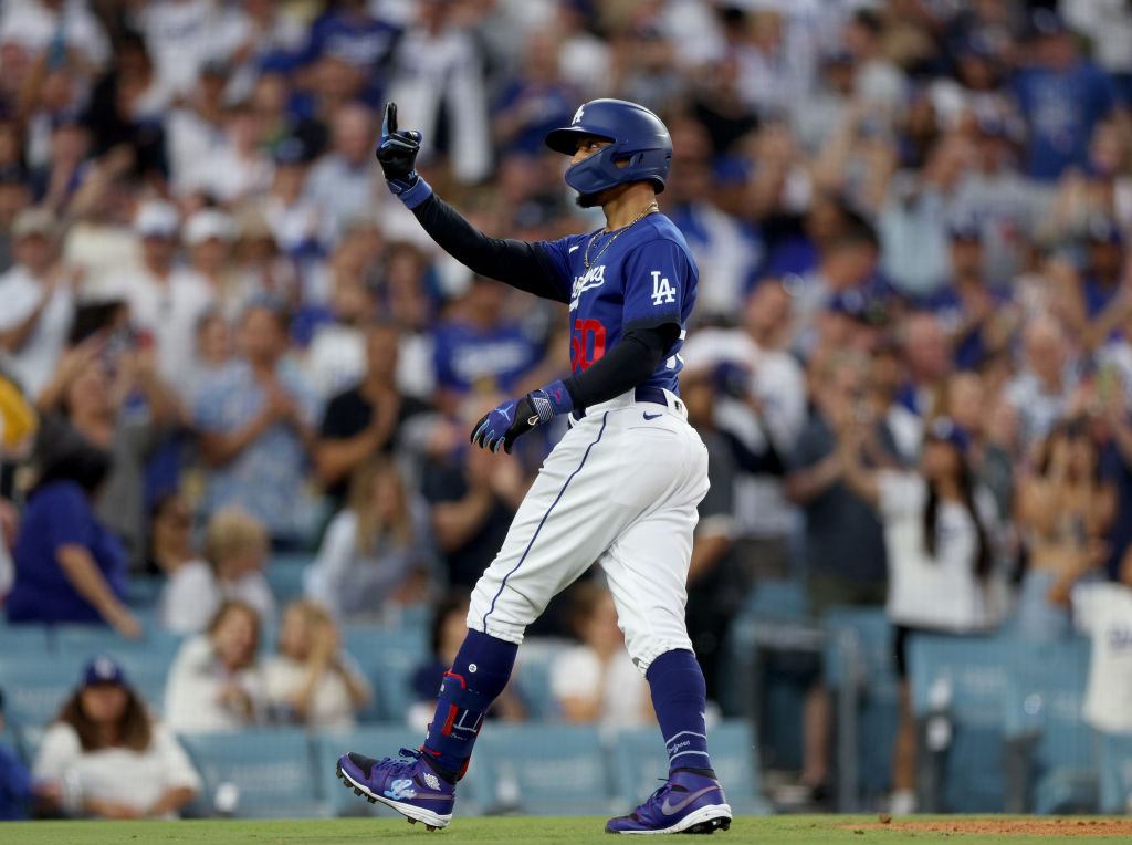 Los Angeles Dodgers' Mookie Betts celebrates a double against the Tampa Bay  Rays during the six …
