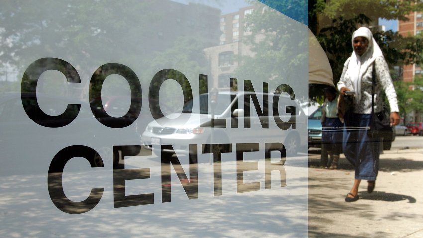 CHICAGO – JULY 18:  Two women are reflected in the window of a cooling center located in a Chicago Department of Human Services center July 18, 2005 in Chicago, Illinois. Chicago operates eight Human Services Centers across the city during extreme weather conditions. The Chicago area has been experiencing an extremely hot and dry summer.  (Photo by Tim Boyle/Getty Images)